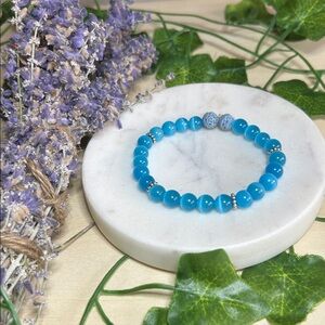 Lake Blue Cats Eye and lava stone gemstone stretch bracelet